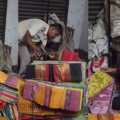 തൂക്കിയല്ലോ നാഥാ....!; പോലീസിനെ കണ്ട് സാരിക്കൂട്ടത്തിനിടയിൽ ഒളിച്ചു; ഒടുവിൽ തൃണമൂൽ നേതാവിനെ പൊക്കി പോലീസ്